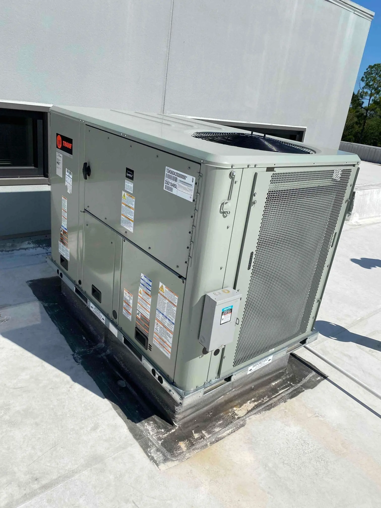 HVAC technician checking refrigerant
