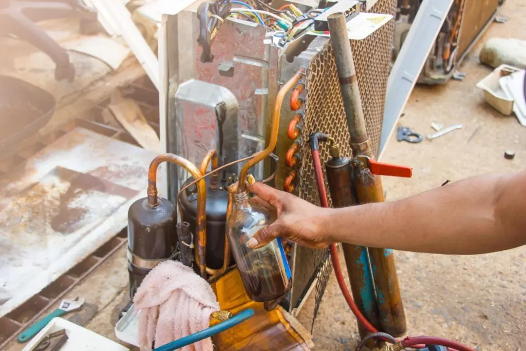 Internal components of an HVAC system during a repair service.