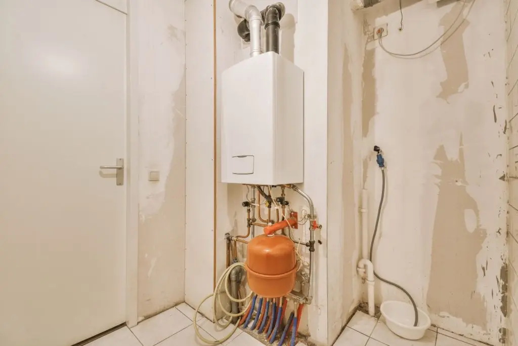 Recently installed white tankless water heater.