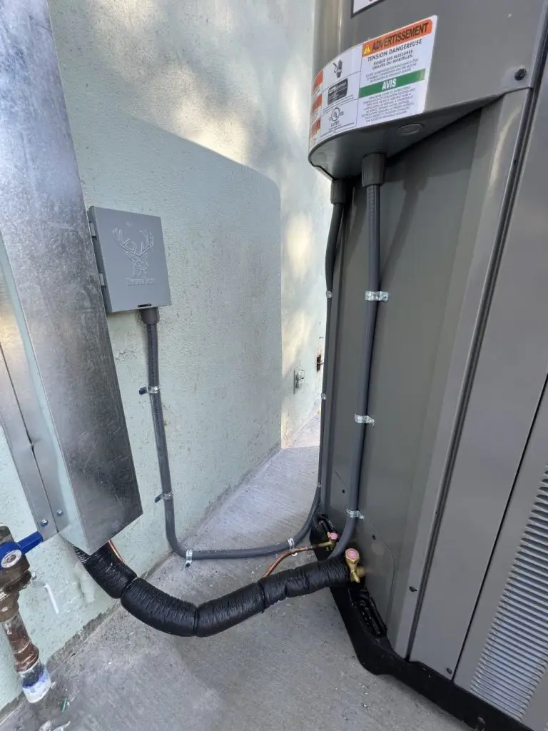 Checking HVAC unit’s connections.